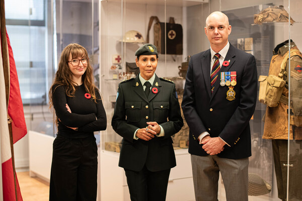 (L to R) Amynte Eygun, Exhibition Manager; Isabelle Racicot, Honorary Lieutenant-Colonel, RMR; Colin Robinson, former Commanding Officer, RMR.