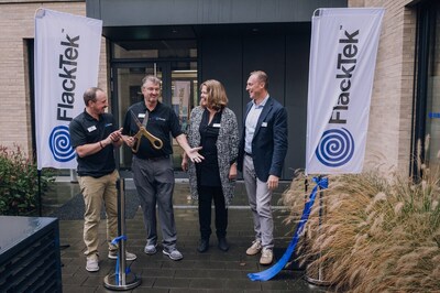 From left, Matt Gross, CEO of FlackTek; Dale Flackett, founder of FlackTek; Claudia Karst; and Andrea Ferrari.