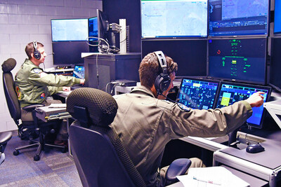 In preparation for a test event, MQ-25 Air Vehicle Pilots monitor the Unmanned Carrier Aviation Mission Control System, including Lockheed Martin’s MDCX™ autonomy platform, located at Naval Air Station Patuxent River, Md., as the system commands General Atomics Aeronautical Systems, Inc.’s technology demonstration surrogate, the MQ-20 Avenger, based at the company’s facility in California. (Photo courtesy of U.S. Navy)