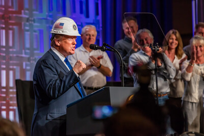 President Trump poses with hardhat while speaking at the 2018 NECA Annual Convention and Trade Show in Philadelphia, PA.