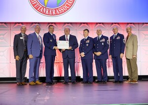 Tampa Bay Defense Alliance and Airlift/Tanker Association Present Tampa Bay Trophy to Mark Kern from Scott Air Force Base, Illinois