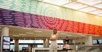 Artist Allison Kunath in front of her piece Everyday Transcendence, Photo by Bolster McKinley