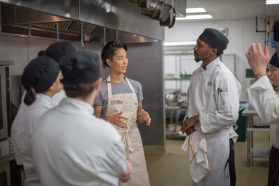 Kristen Kish (center) joins Escoffier as its Chef-in-Residence.