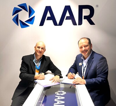 Cedrick Fontes, Whippany’s President, and Frank Landrio, AAR’s Senior Vice President of Distribution, meet for a signing ceremony.