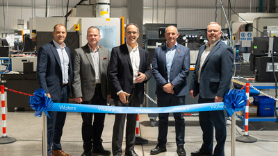 Leaders celebrating the opening of Waters site in Longbridge, United Kingdom at a ribbon cutting event in November 2024. 