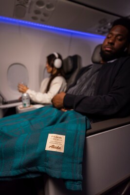 Crafted from soft, durable fabrics, our new First Class blanket -- in partnership with Filson -- offers comfort and style, ensuring that our guests stay snug on long-haul flights.