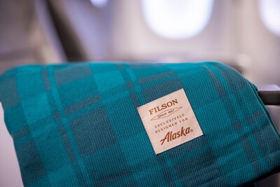 Envelop yourself in Alaska's new First Class blanket, designed in partnership with Filson -- the iconic Pacific Northwest-based outdoor outfitter.