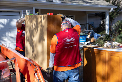 Hundreds of Lowe’s red vest volunteers deployed alongside nonprofit partners to support cleanup efforts, helping to clear mud and debris across Western North Carolina.