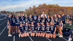 Jonathan Gessert, the CEO of 321 Web Marketing, with Urbana High School's all-girls flag football team