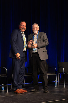 Steve Van Duyn, Blue Diamond’s Board Chairman, presenting the 2024 Chairman Award to Bill Brush.