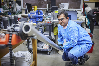 University of Oklahoma Mewbourne College of Earth and Energy researcher working in a lab. OU is leading the Oklahoma Carbon Hub, an initiative to research potential carbon storage sites.