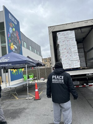 The truck arrives with 1,000 turkeys at BUILD's facility in Chicago.