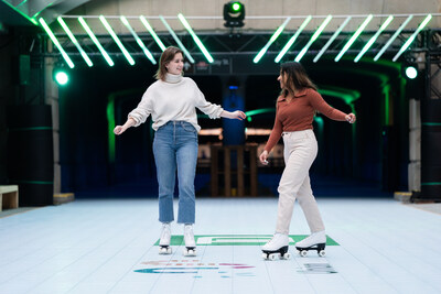 Two skaters take a sping around the rink at the Roller Express. (CNW Group/Osmington, (Union Station) Inc)