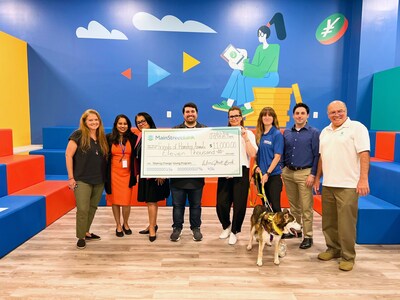 MAKING AN IMPACT: Employees of MainStreet Bank in Fairfax, Virginia, present Friends of Homeless Animals with an $11,000 donation. The community bank started an employee-directed giving program in 2023 that entrusts each worker with $1,000 to donate annually where they see a need.