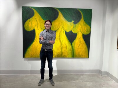 Curator and collector Antonio Permuy standing in front of "Nocturno en el patio" (2018) by Miguel Fleitas.