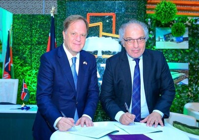 Group Chief Operating Officer of Rendeavour and Country Head of Tatu City Preston Mendenhall, and CEO of the World Free Zones Organization Dr. Samir Hamrouni sign an agreement appointing Tatu City as the National Contact Point and Regional Office for World Free Zones Organization during the 9th African Special Economic Zones Annual Meeting 2024.