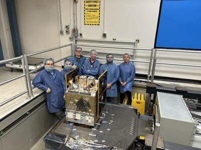 Turion's engineering team proudly standing beside their DROID.002 satellite ahead of launch vehicle integration.