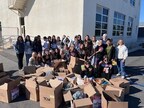 Dwyer Middle School students display their generous pasta and sauce donations.