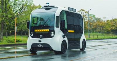 The Toyota e-Palette, powered by May Mobility's autonomous driving technology, drives down a private street at the Toyota Motor Kyushu's Miyata factory.