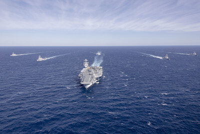 The world's largest aircraft carrier, USS Gerald R. Ford (CVN 78), sails in formation with the Arleigh Burke-class guided missile destroyers USS Winston Churchill (DDG 81), USS Mitscher (DDG 57), USS Mahan (DDG 72), USS Bainbridge (DDG 96), and USS Forrest Sherman (DDG 98) in the Atlantic Ocean, Nov. 12, 2024.  (U.S. Navy photo by Mass Communication Specialist 2nd Class Jacob Mattingly)