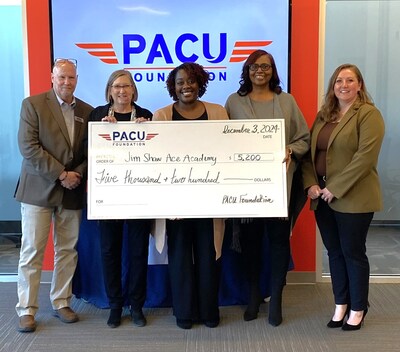 Pictured is the check presentation to the Jim Shaw ACE Academy, one of six check presentations of $5,200 to North Carolina charities. Left to right are the PACU Foundation’s Gifting Committee Chairman, James Moore; the foundation’s Board Chair, Mary Vitale; and ACE Academy representatives Alexandria Shaw, the organization’s President, and Jacqueline Johnson.