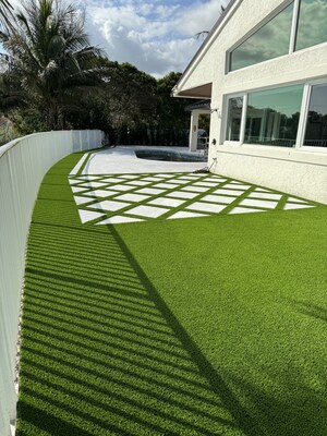 Residential artificial turf installation in Jupiter, FL, by Palm Beach Outdoor Design Group.