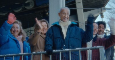 Andrew Ridgeley waves from above in Albert Heijn’s reimagination of Last Christmas, recreating the iconic moment from the original music video.