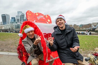 Martin and Roman Kemp announce ‘Maltesers’ as the capital’s top choice of Celebrations in Potters Field, London, as part of the brand's campaign to get the nation debating their favourite chocolate. Issue Date: Friday December 6, 2024. PA Photo. As part of the #MyFavourite Celebrations Christmas Campaign, Celebrations is inviting the public to have their say in a nationwide debate. Research commissioned by Celebrations shows that over a third of Londoners rank Maltesers as the city's favourite, with more than half viewing the gift box as 'a must-have Christmas treat', over cookies and mince pies. Photo credit should read: Jas Lehal/ PA Media Assignments