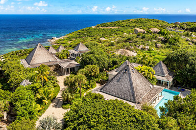The oceanside villas offer panoramic views of the Caribbean Sea and Atlantic Ocean. Premier island amenities such as Spring Bay, Savannah Bay, Valley Trunk, The Baths, and Virgin Gorda Yacht Harbour are within close proximity. BVILuxuryAuction.com.