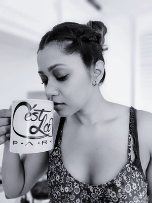 Savoring a quiet moment with a touch of Parisian elegance—C'est La Vie in every sip.