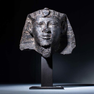 Rare Egyptian black granite sphynx head of pharaoh of the XXVth Dynasty (747-653 BC), probably Taharqa (690-971 BC). Size: 130mm x 120mm (5.1in x 4.7in). Weight: 2.25kg (4lbs 15oz). Provenance: The Prince Collection, 1990s-2014; ex Jack Josephson private collection. Opening bid: £20,000/$25,485