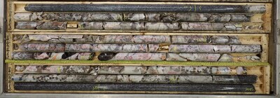 Figure 1 – Photo of drill core from PWM-24-242 displaying 8 meters of Pollucite from West Joe at the Company’s Case Lake Property, Ontario, Canada (CNW Group/Power Metals Corp.)