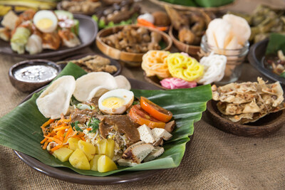 Gado-Gado, an authentic Indonesian dish of steamed vegetables, tofu, and egg, accompanied by a sweet and savory peanut sauce.