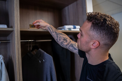 Max Domi placing an Aires Tech Lifetune Zone into his locker. The Lifetune Zone offers EMF protection for your environment up to 93 feet in diameter, creating a safe zone by neutralizing electromagnetic radiation emitted from electronic devices for healthier living spaces.