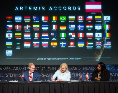 NASA Administrator Bill Nelson, left, and U.S. Department of State Acting Assistant Secretary in the Bureau of Oceans and International Environmental and Scientific Affairs Jennifer R. Littlejohn, right, look on as Ambassador of the Republic of Austria to the United States of America Petra Schneebauer, signs the Artemis Accords, Wednesday, Dec. 11, 2024, at the Mary W. Jackson NASA Headquarters building in Washington. The Republic of Austria is the 50th country to sign the Artemis Accords, which establish a practical set of principles to guide space exploration cooperation among nations participating in NASA’s Artemis program. Credit: NASA/Joel Kowsky