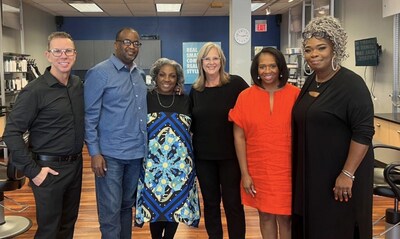 The Jones family with the Supercuts stylists who did their hair makeover (Photo Credit: Military Makeover)