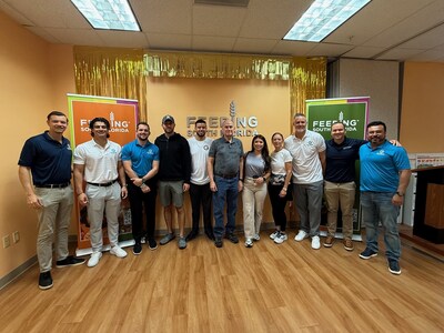 Grant Connes and the Global Wealth Management team volunteer at Feeding South Florida, preparing to collect and donate food to support local families in need during the Thanksgiving season.