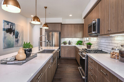 Cabinets in earthy wood tones offer a timeless design.