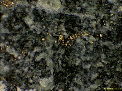 Photo 10: Microscopic view of mineralization in hole WD24-35. (CNW Group/Omineca Mining and Metals Ltd.)