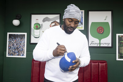 Former Giants wide receiver, Hakeem Nicks joins Giants fans in raising a toast at Tanqueray’s Classic or Nothing Diner