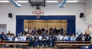 Passport Auto Group Surprises 95 Local Students with Brand-New Bikes