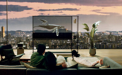 Despite its stunning 77-inch screen size, the LG OLED T enhances the feeling of space within a room, providing a sense of openness that conventional TVs simply cannot. Its transparency allows it to be placed centrally without being obtrusive or positioned in front of windows without blocking natural light or views of the outdoors.