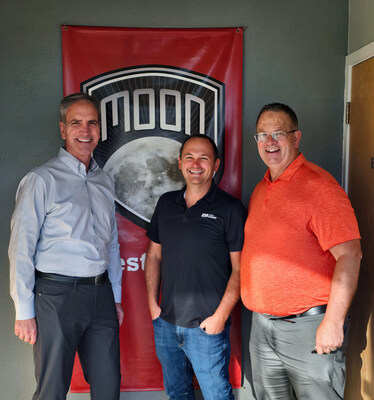 Pye-Barker's Chief Business Development Officer Eric Garner (center), Moon Security Owner Michael Miller (right), and Moon advisor George De Marco (left).