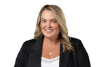 Headshot of Julia Wilson, SVP of Real Estate Management