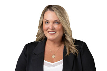 Headshot of Julia Wilson, SVP of Real Estate Management