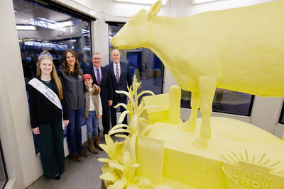 "From Moo to Marvel: Dairy Cows Power Pennsylvania" is the theme of the 34th Butter Sculpture at the Pennsylvania Farm Show, unveiled by the American Dairy Association North East, Pennsylvania Dairy Promotion Program and the Pennsylvania Department of Agriculture on January 2, 2025. Left to right: Pennsylvania Dairy Princess Charlotte Wallace, Chester County Dairy Farmer Kacie Hershey and her son Wyatt Meck, Agriculture Secretary Russell Redding, and ADANE CEO John Chrisman.