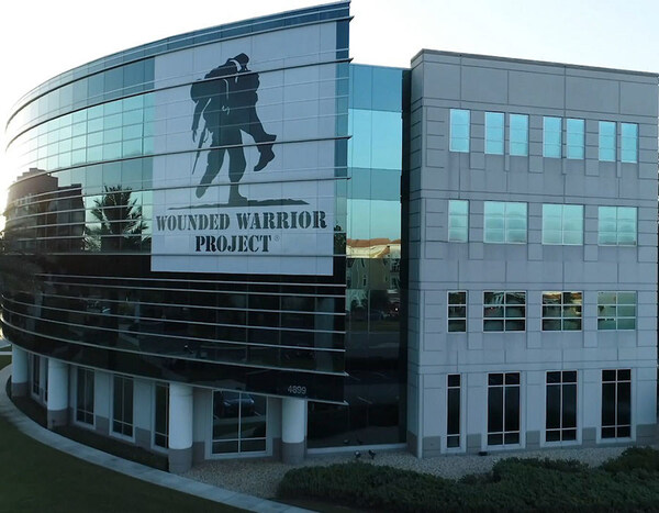 Exterior view of an office building displaying the Wounded Warrior Project logo