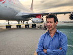 Dan Hart, stands in front of LauncherOne