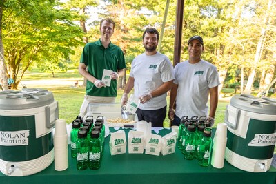 Photo Credit: Event Photographer Marikate Venuto. Nolan Painting team members Alex, Stefanos, and Milton at The Willows Park Preserve during an event in July, 2024.