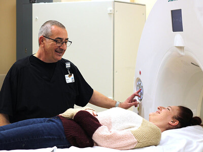 CT Coordinator Anthony Fatovic prepares a patient for a CT scan at BayCare Outpatient Imaging (Trinity).